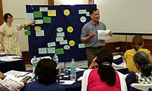 Victor Pinga, SPRING Agriculture Advisor, and Ashley Aakesson, SPRING SBCC Advisor, feature the SPRING linking agriculture-to-nutrition pathways as they lead an interactive session to orient partners on nutrition-sensitive agriculture.