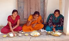 Three women eating