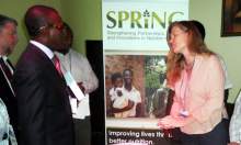 In suite is Minister of Agriculture (Fiifi Kwettey) interacting with Fiona Edwards her team about SPRING/Ghana