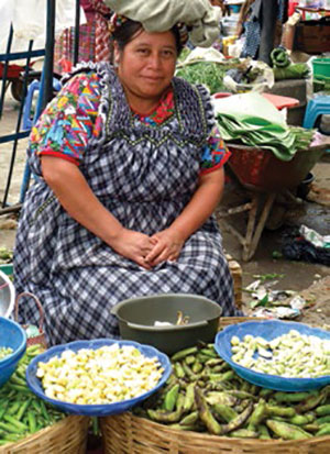 woman selling food at market