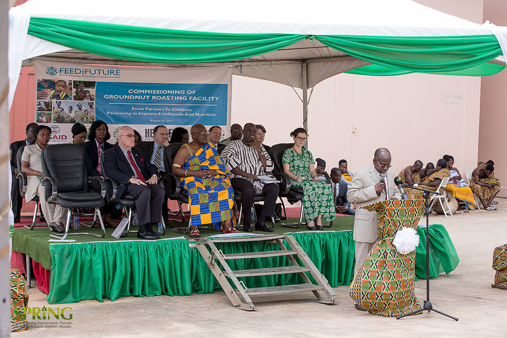 Regional Minister for Ashanti, Hon. Simon Osei-Mensah, delivering his address. On the dais behind him, in front row (L – R): the US Ambassador to Ghana, H.E. Robert P. Jackson; the Royal Adontenhene (Representative of the Ashanti King, The Otumfuo); Minister for Business Develoment, Hon. Ibrahim Awal Mohammed; and Director of PPB, Ms. Carly Edwards.