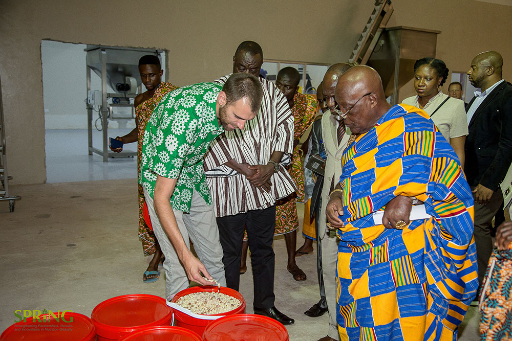 Martin Histand, PPB Director of Operations, explaining how the sorted groundnuts are used later in production of healthy foods.