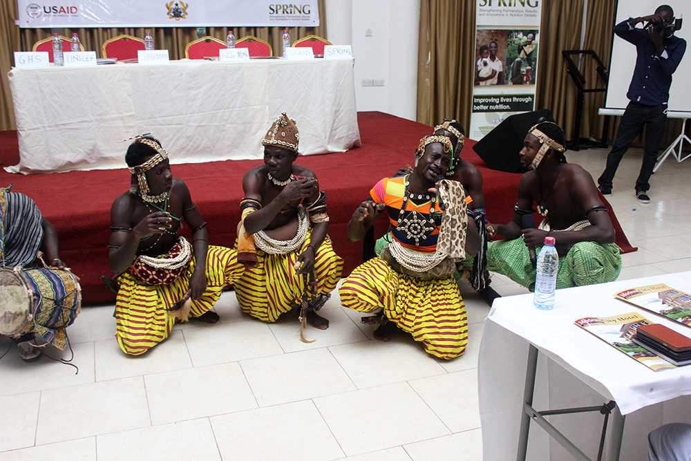 A cultural troupe performing traditional music and dance at the event.