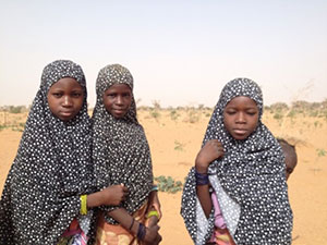 Young girls taking care of their siblings, Baleyara, Niger, May 2014.