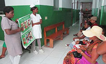 Nurses at the improved prenatal clinic lead group education about nutrition with pregnant women awaiting consultations. 