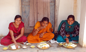 Women eating in the shade