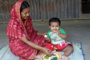 Photo of complementary feeding by FNS beneficiary at Ramchandropur FNS, Narail Sadar