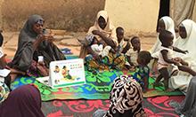 Women attend a C-IYCF support group meeting in Nigeria. Sascha Lamstein, SPRING.