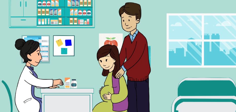 Pregnant mother and father visit the doctor's office and the doctor gives them supplements for the mother.