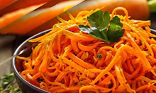 Close up image of shaved carrots.