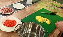 Clip from the video featuring food preparation. 