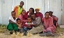 Thumbnail image of the Session Guide: a group photo of a family smiling. 