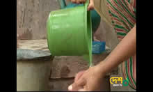 Screen capture of woman washing hands