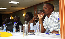 Participants listen to SPRING’s findings on the current status of maize milling.